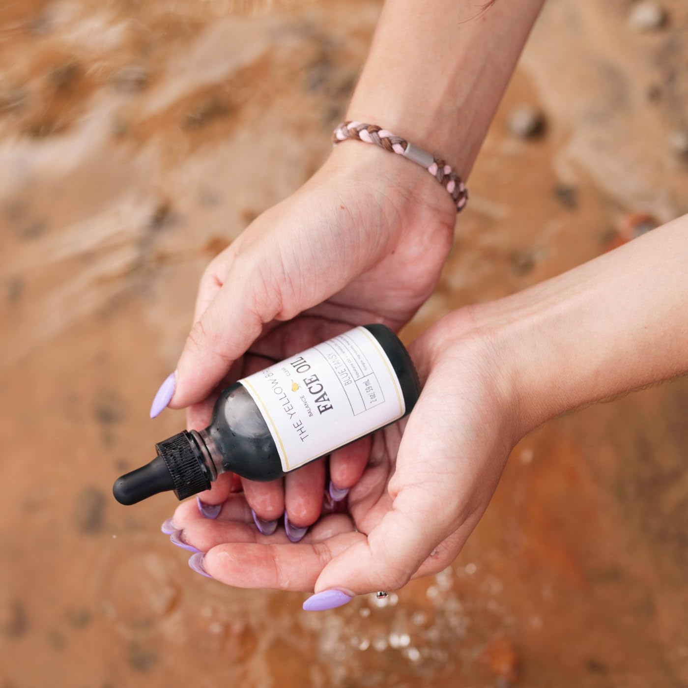 The Yellow Bird Balancing Blue Tansy Oil anti-aging focus suggests smoother, firmer-looking skin.