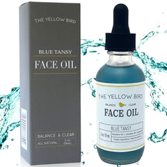 The Yellow Bird Balancing Blue Tansy Oil bottle pour promotes radiant, nourished skin.