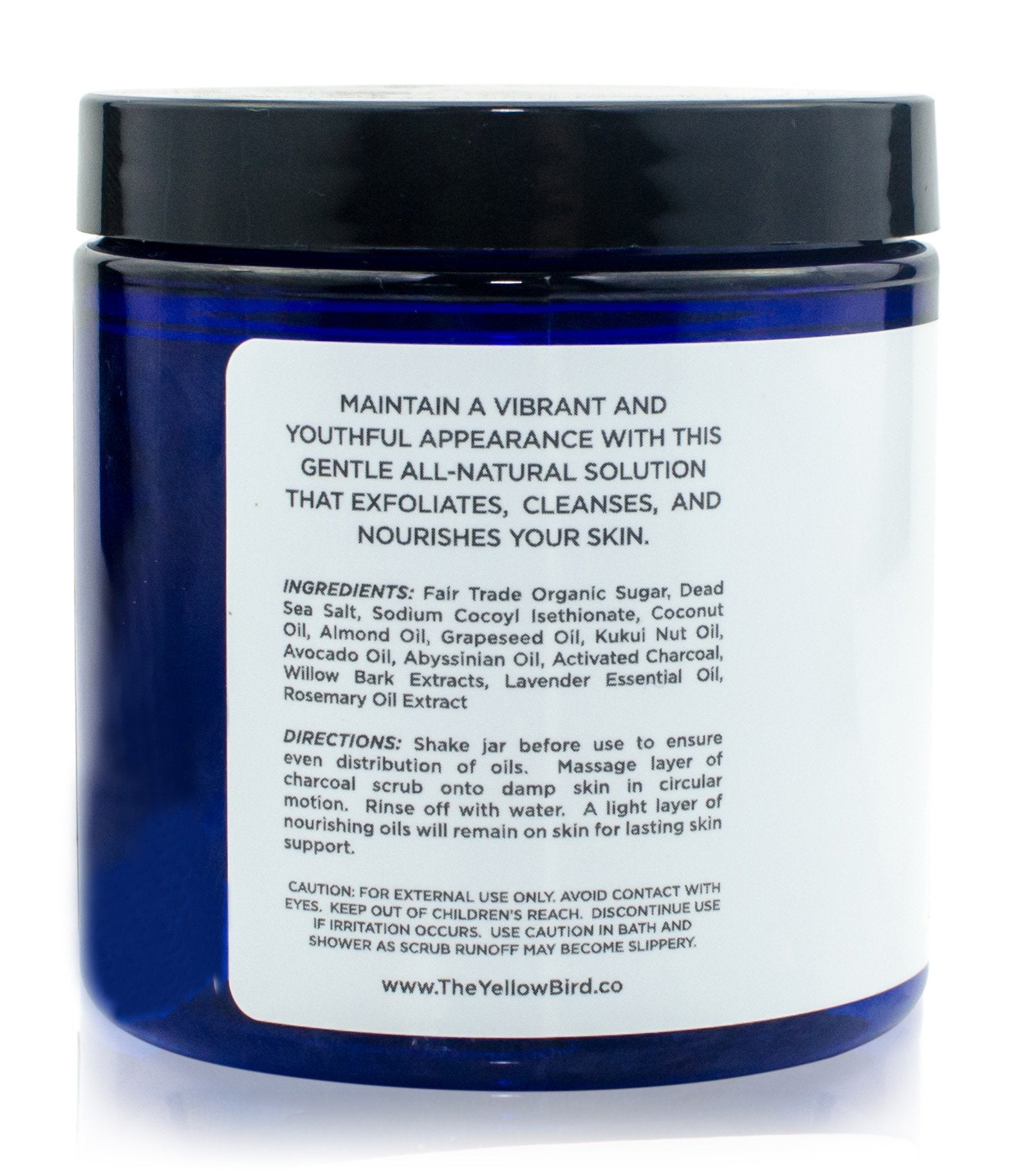 The Yellow Bird scrub label highlights cruelty-free status and safe use.