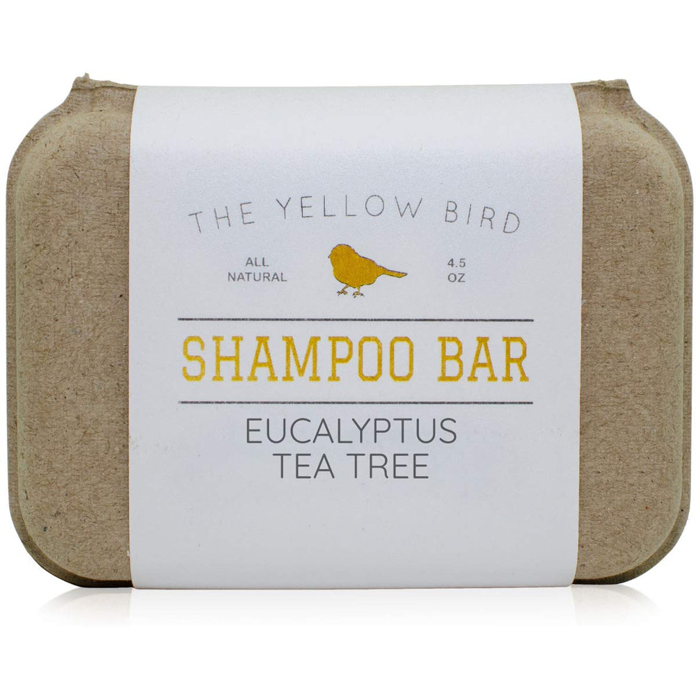 The Yellow Bird eucalyptus tea tree shampoo bar packaging showcases zero-waste design.