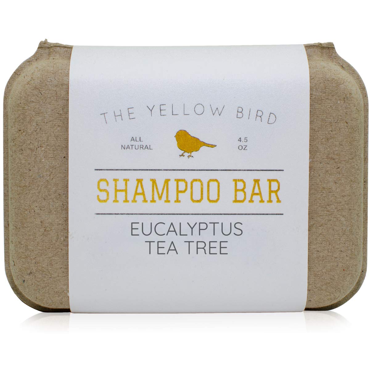 The Yellow Bird eucalyptus tea tree shampoo bar packaging showcases zero-waste design.