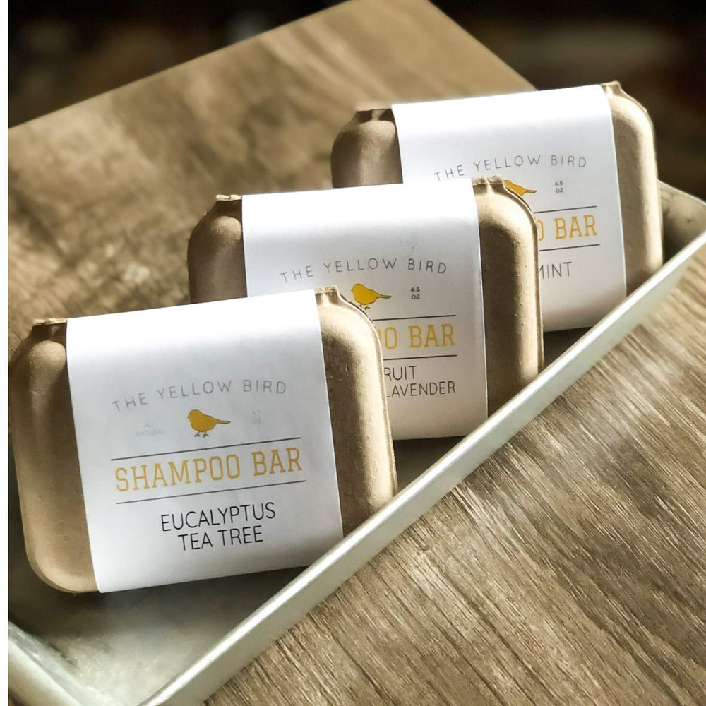 The Yellow Bird eucalyptus tea tree shampoo bar features a refreshing peppermint scent.