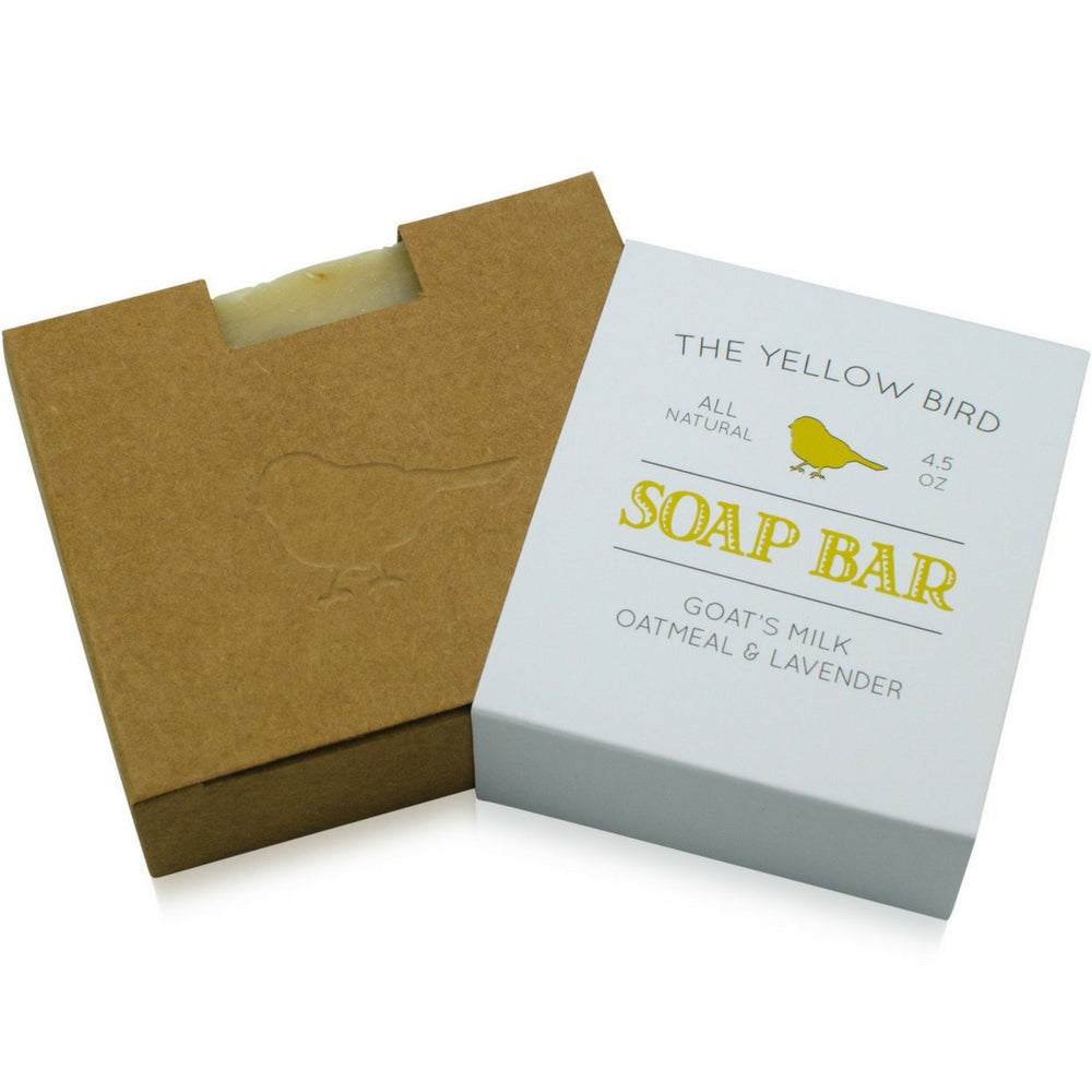 Closeup of The Yellow Bird Lavender Goats Milk Soap Bar showing creamy texture.