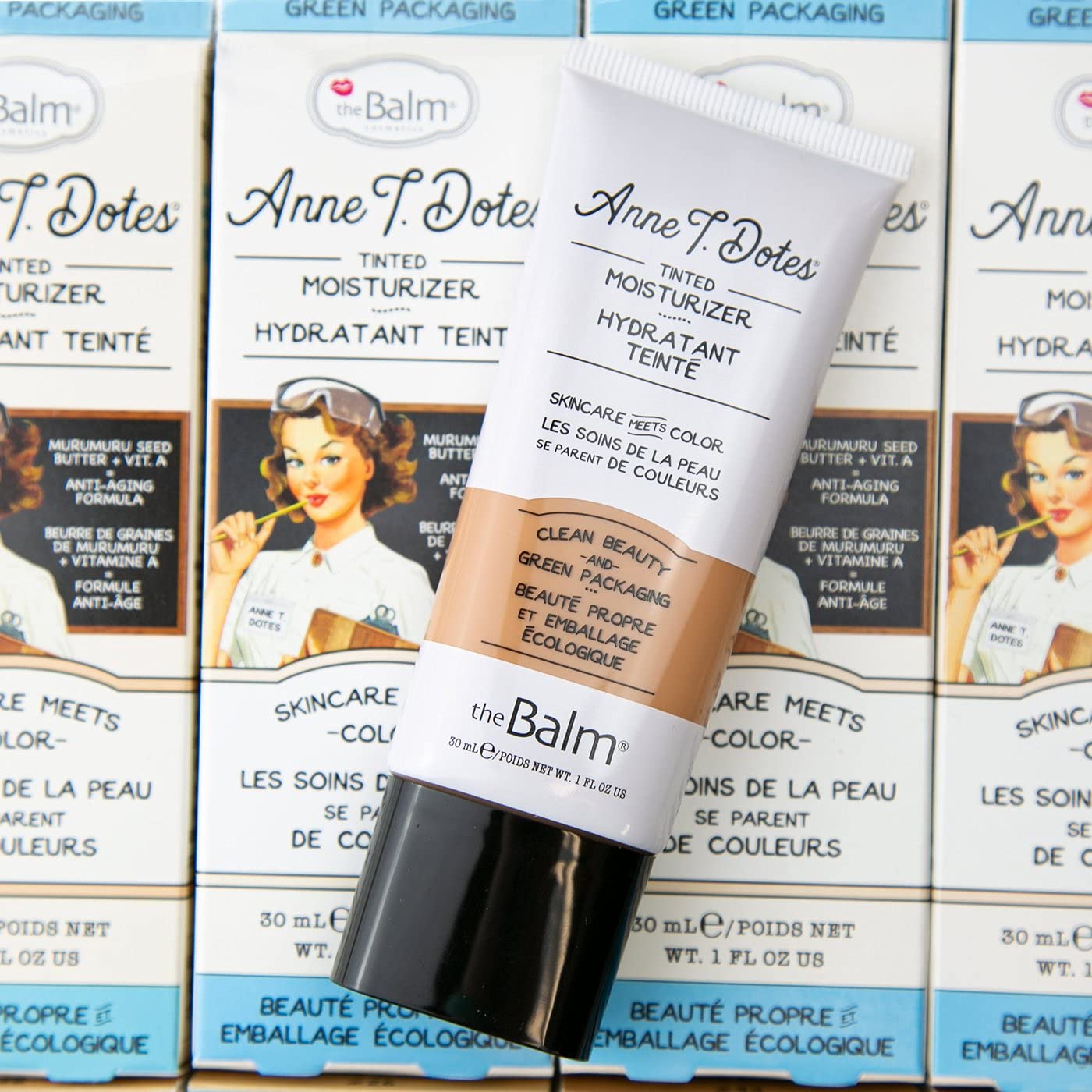 theBalm Anne T. Dotes packaging highlighting compact bottle and travel-ready size.