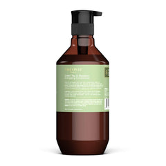 Close-up of Theorie conditioner bottle highlighting color-safe formula for vibrant color.