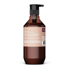 Creamy Theorie conditioner texture close-up for detangling and smooth styling