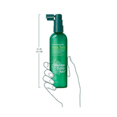 Thicker Fuller Hair bottle on dresser highlighting easy home use.