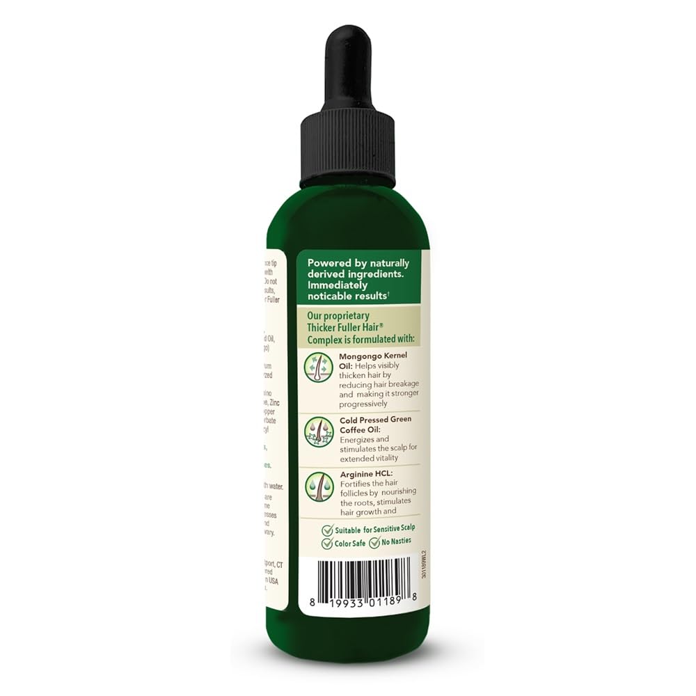 Product next to thickening serum on vanity suggests layered regimen