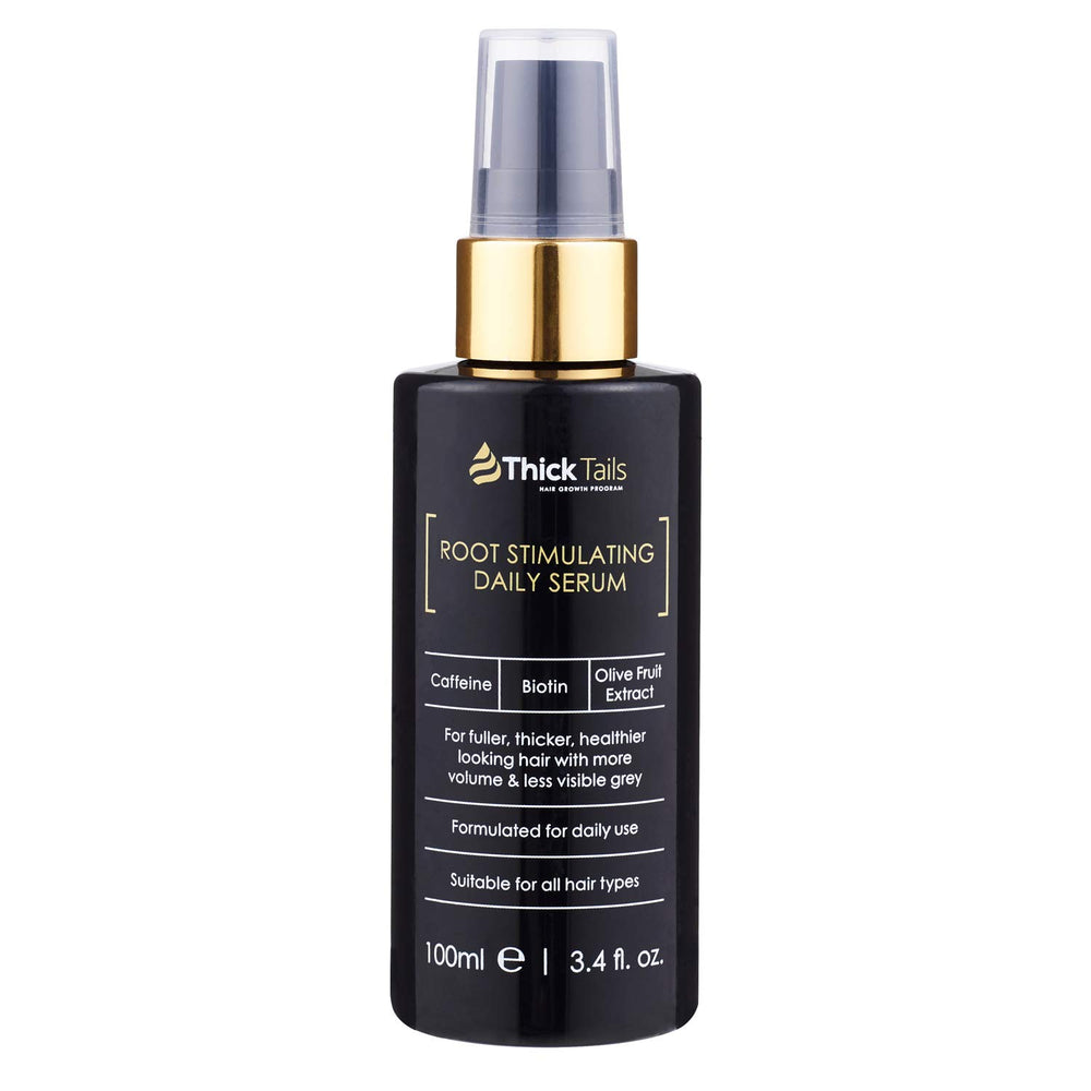 ThickTails hair growth serum bottle close-up supporting daily scalp care for fuller roots.