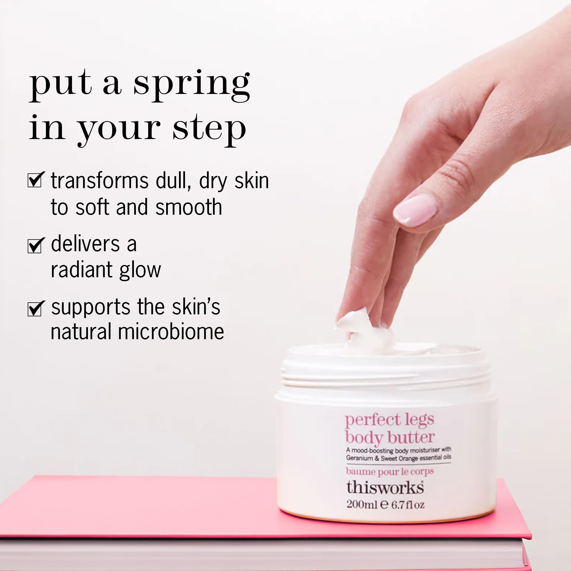 Hands applying THISWORKS Perfect Legs Butter for quick absorption and soft skin