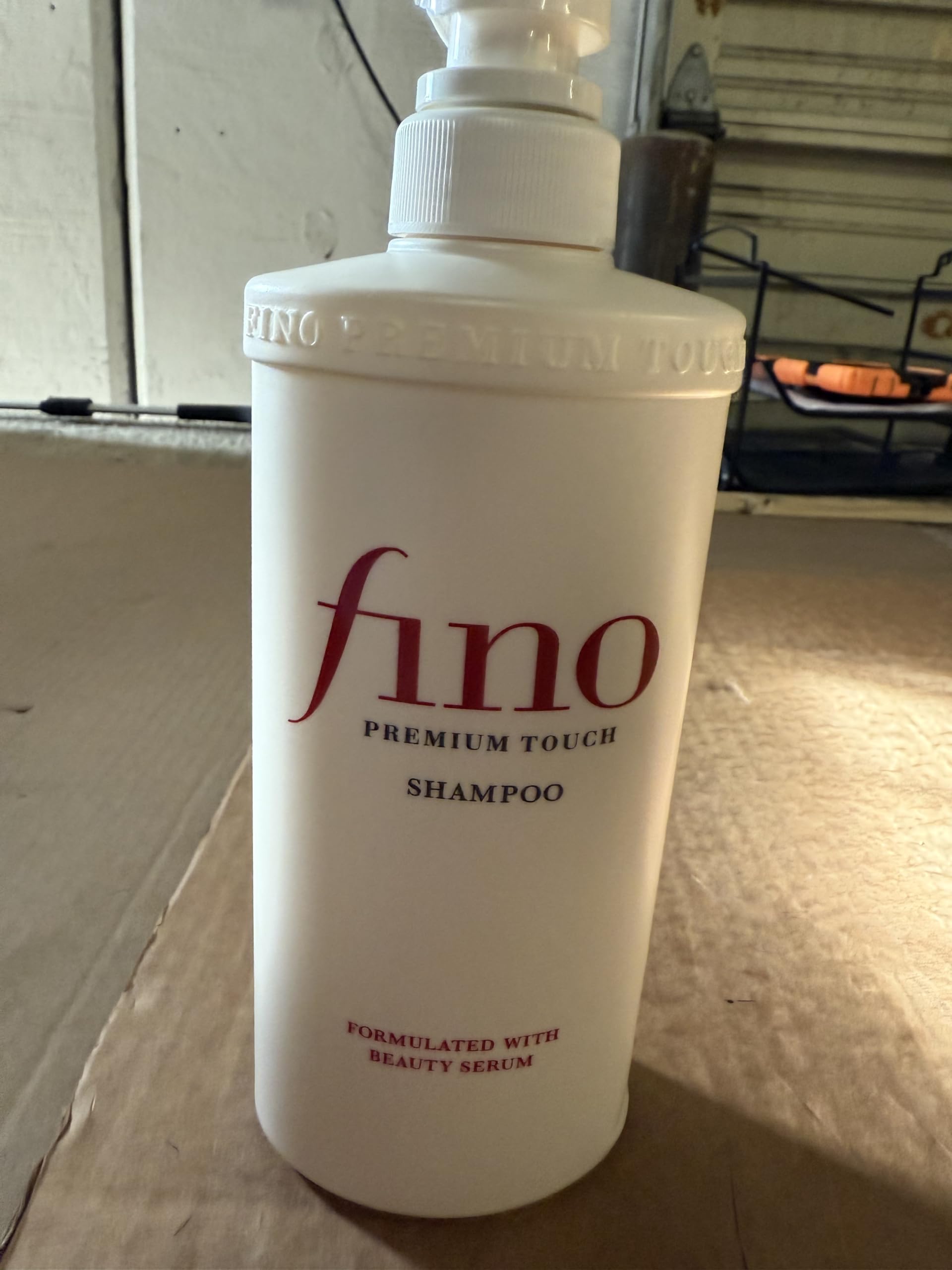 Creamy lather of JapanFino shampoo shown during wash.