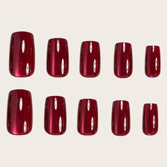 Thuoxde gradient shiny nails showing bold red-to-glitter finish