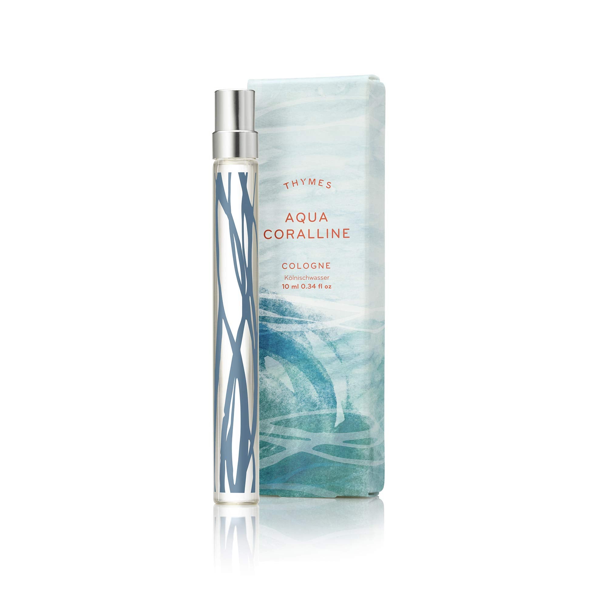 Thymes Aqua Coralline Cologne Pen held for on-the-go fragrance touch-ups.