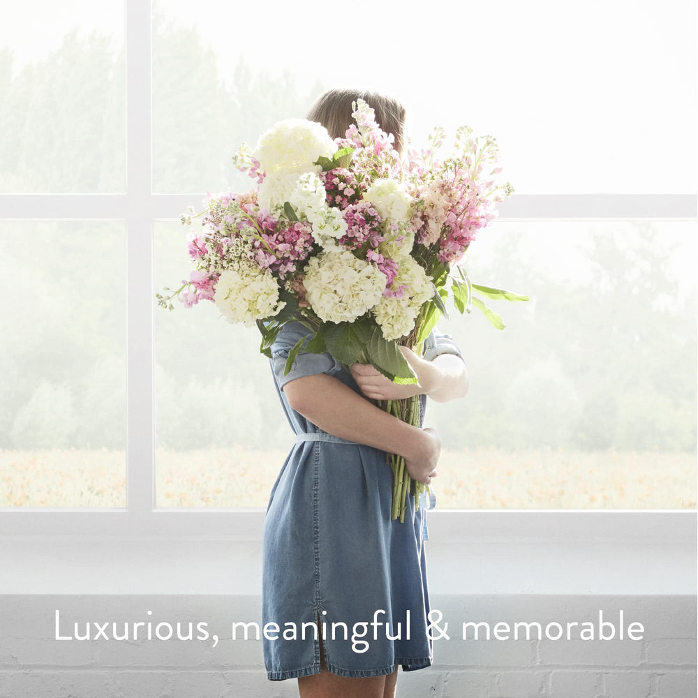 Thymes Aqua Coralline shelf display suggests versatile fragrance for office wear.