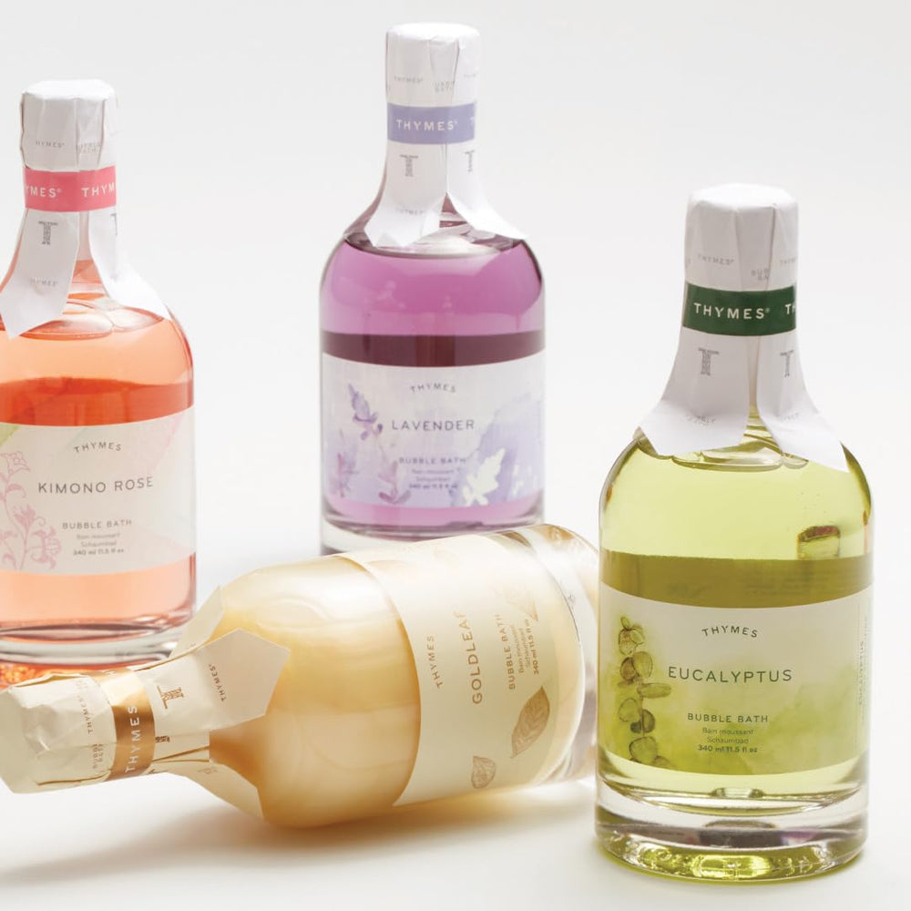 Thymes Bubble Bath Lavender foam shows rich lather for a relaxing soak.