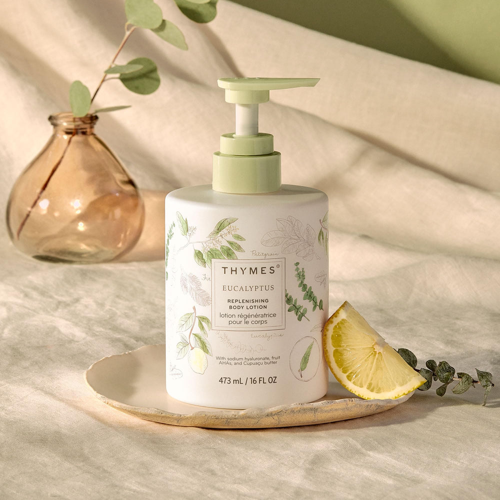Thymes lotion close-up shows eucalyptus and lemon fragrance notes.