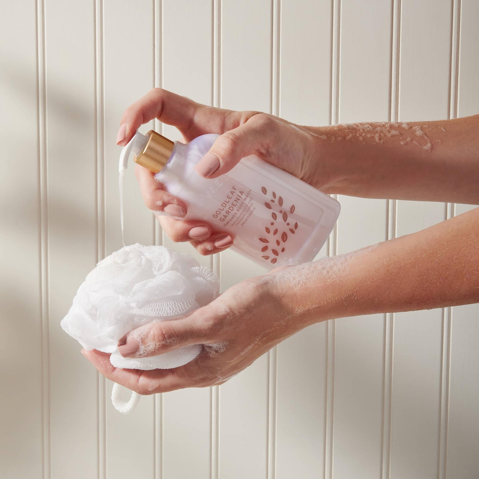 Closeup of Thymes body wash label highlighting Goldleaf Gardenia fragrance