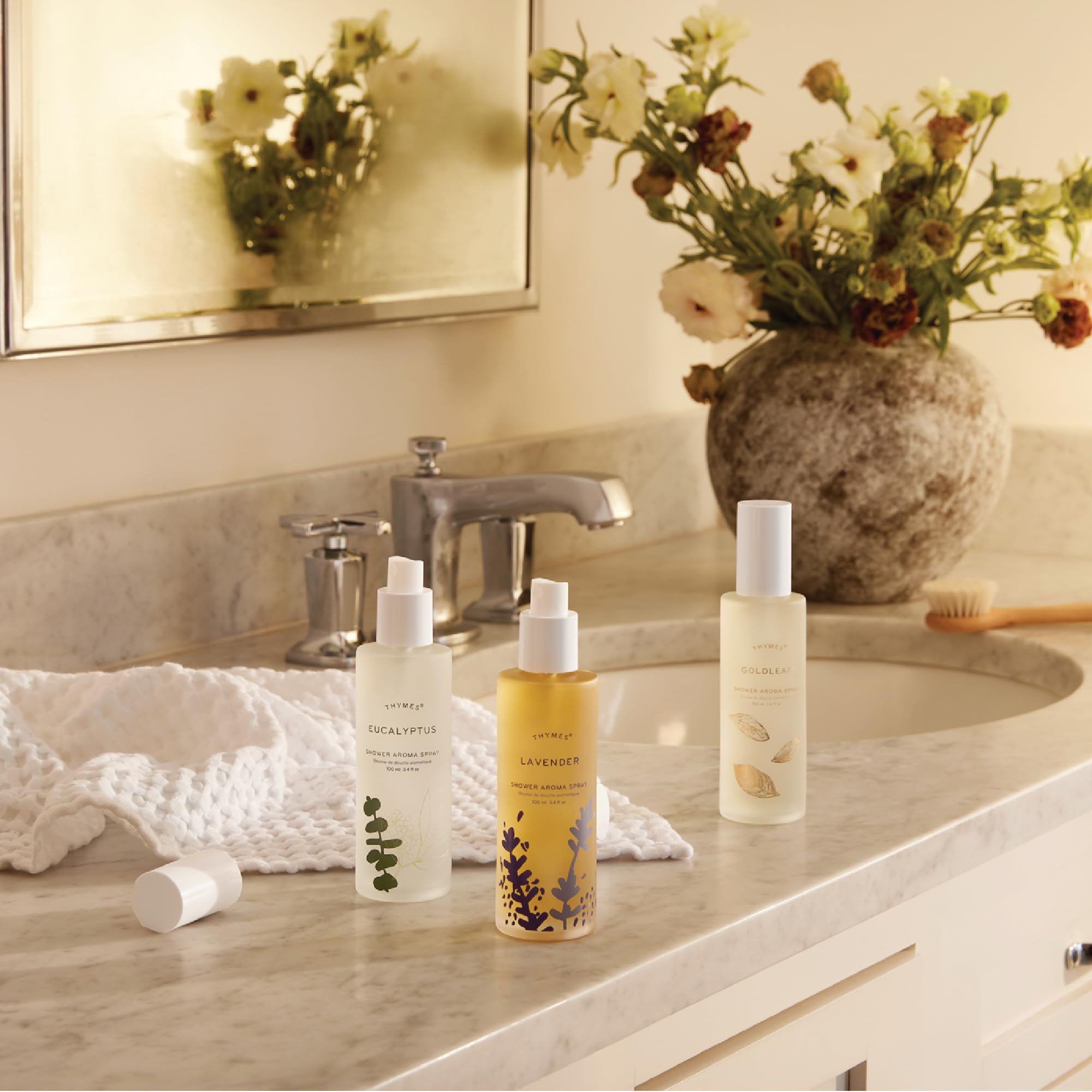 Thymes Eucalyptus Shower Spray misting in steamy shower supports a refreshing ritual.