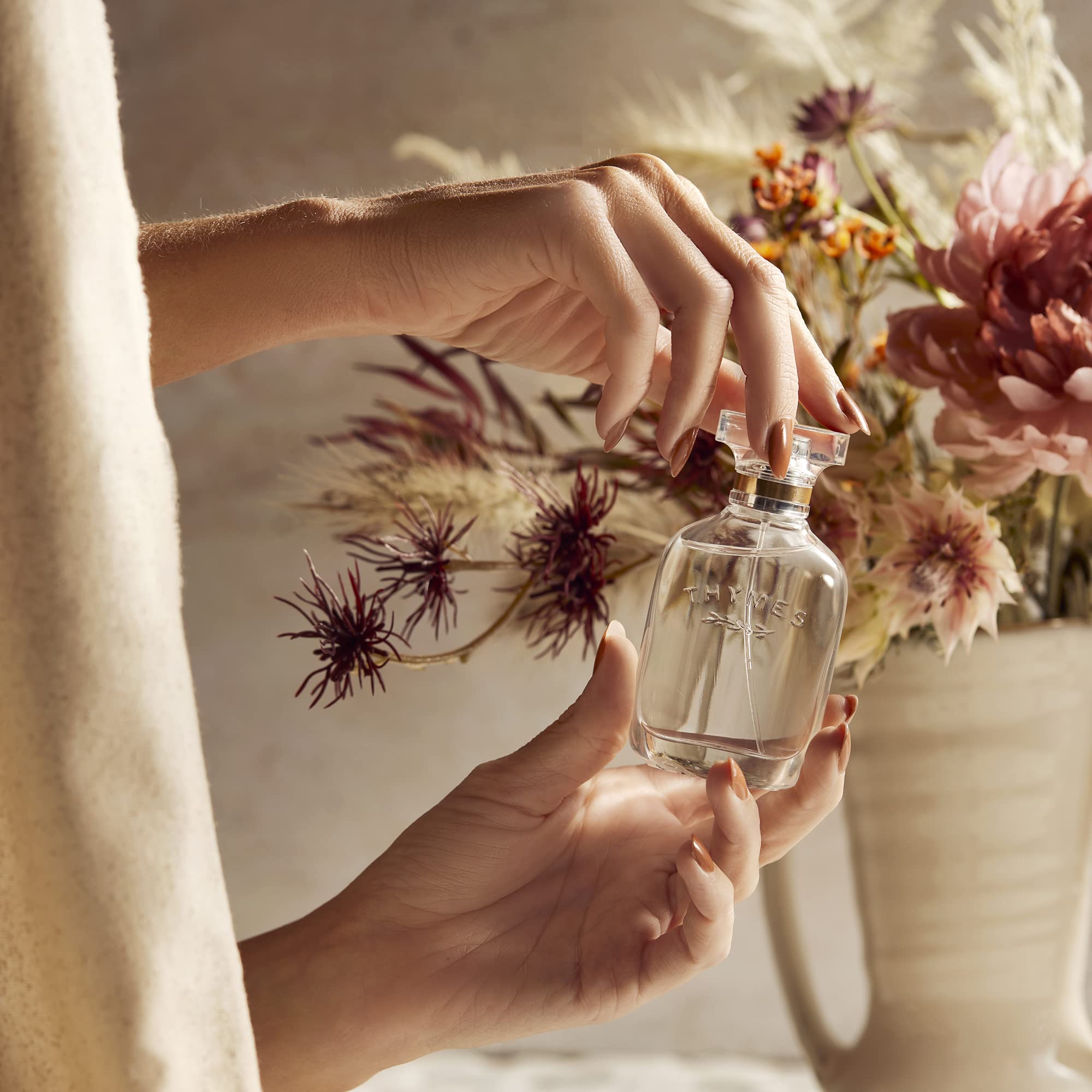 Thymes Sienna Sage palo santo hint creates calming ambiance.