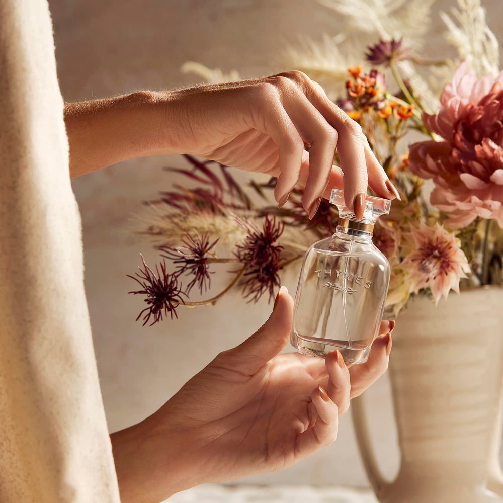 Thymes Sienna Sage palo santo hint creates calming ambiance.