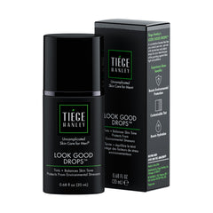 Tiege Hanley Look Good Drops bottle pour shows a buildable tint for a natural glow.