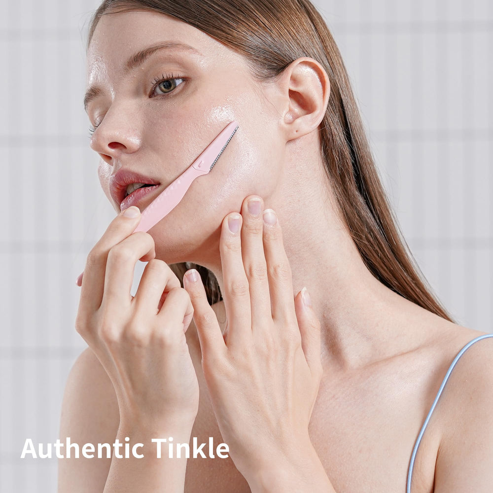 Tinkle Everglow Dermaplane Razor safety cover protecting skin during use.