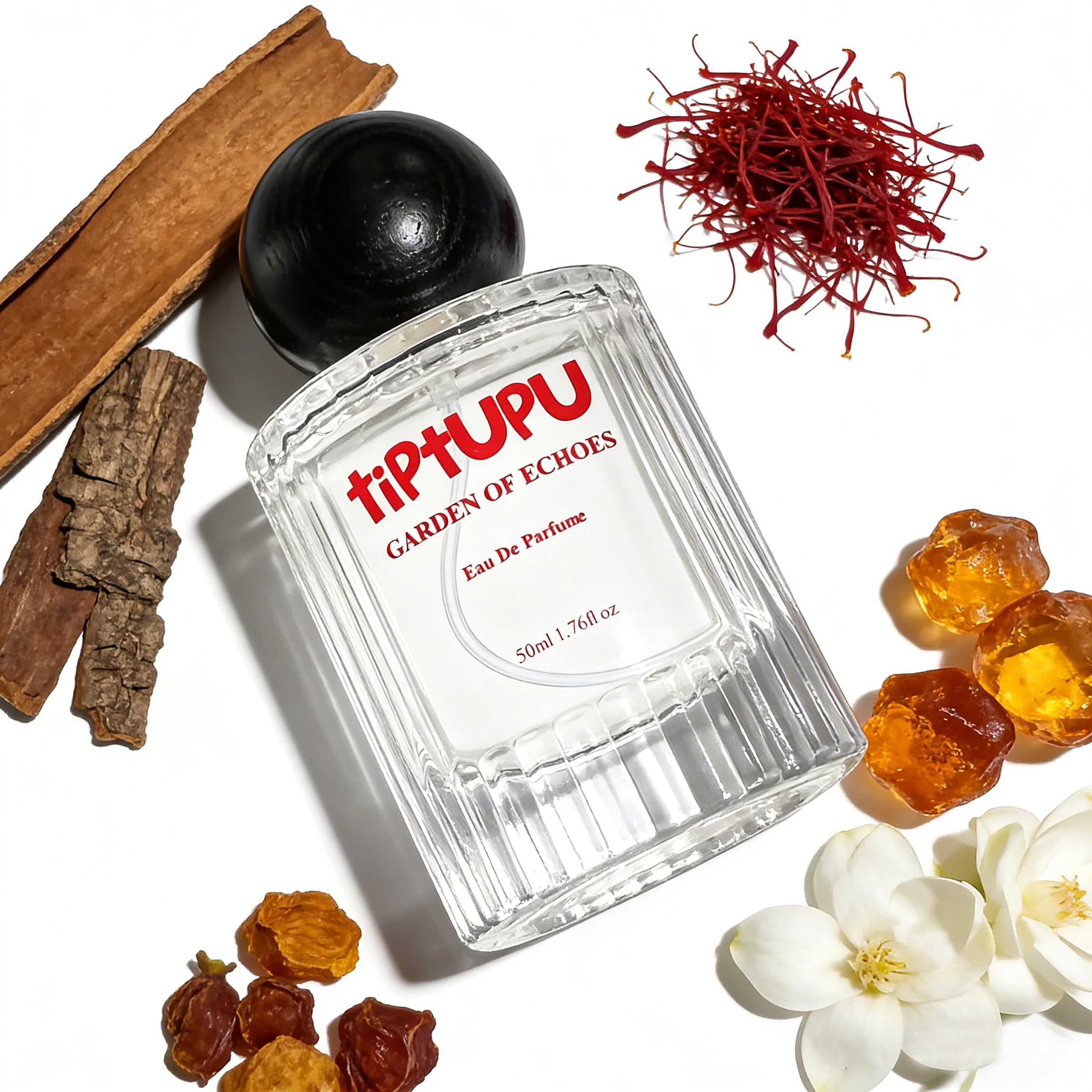 tiptupu amberwood ambergris heart emphasizes warm, resinous depth for evening wear.