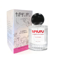 tiptupu unisex perfume bottle closeup showcases universal appeal.