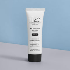 TIZO AM Replenish packaging close-up highlights compact, preservative-free formula