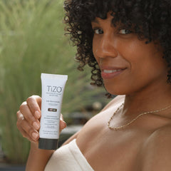 TIZO AM Replenish SPF 40 on skin during application for quick absorption