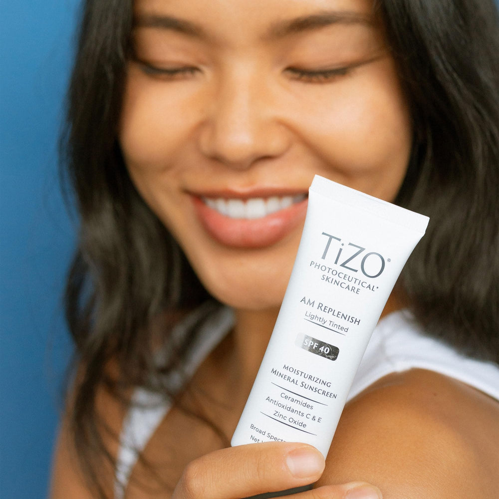 TIZO AM Replenish SPF 40 swatch texture demonstrates sheer tint blending