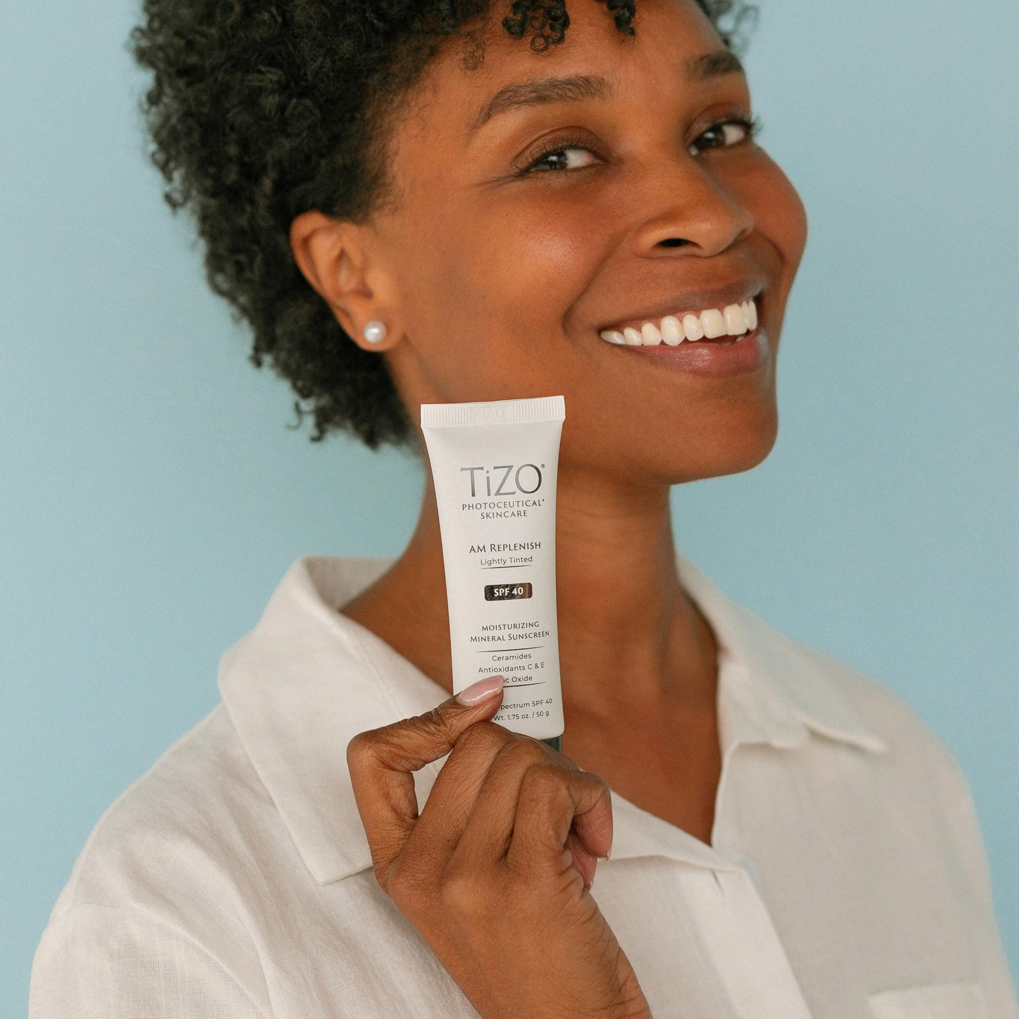 TIZO AM Replenish SPF 40 water-resistance badge suitable for workouts
