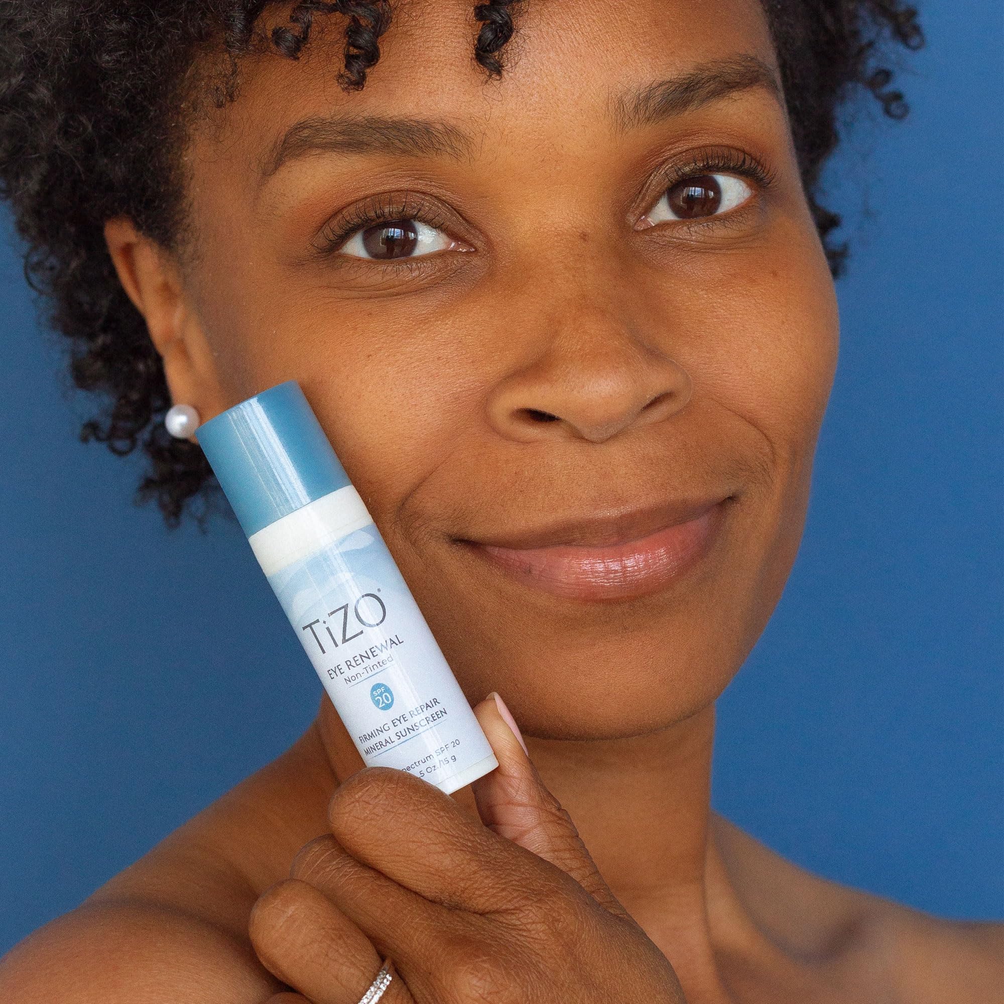 TIZO Eye Renewal SPF20 packaging with sleek design and compact tube