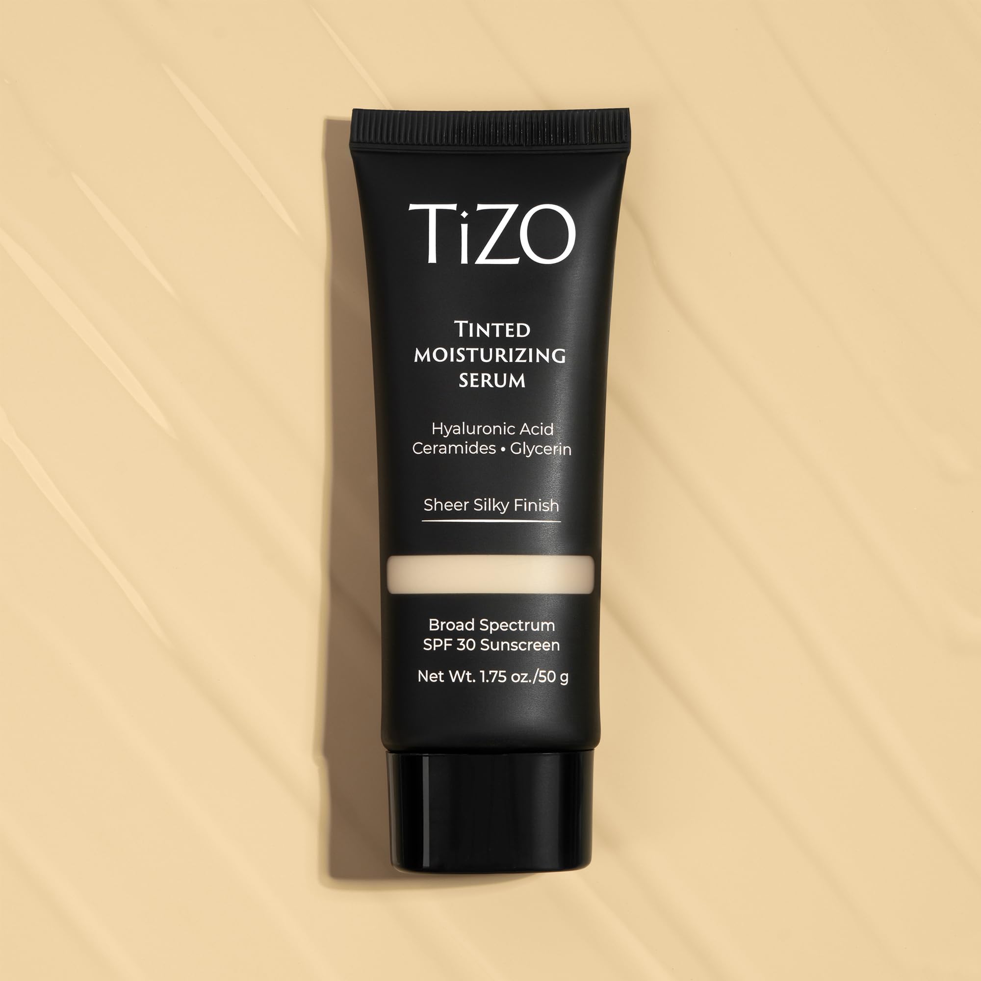 TIZO SPF 30 mineral serum close-up highlights antioxidant protection and lightweight feel.