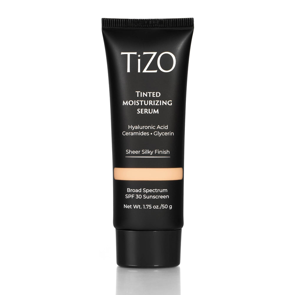 TIZO tinted moisturizing serum bottle close-up with mineral SPF 30 protection
