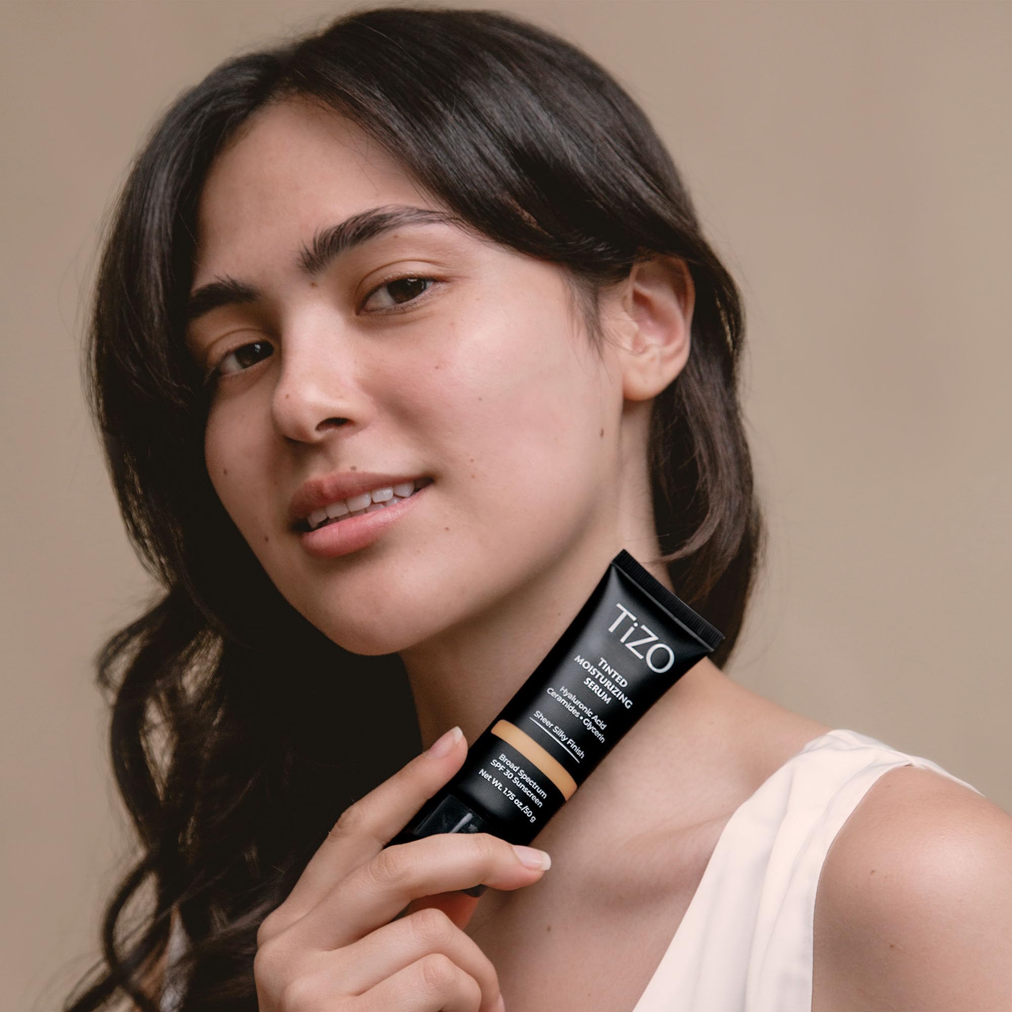 TIZO bottle emphasizes antioxidant-rich formula with vitamins C and E