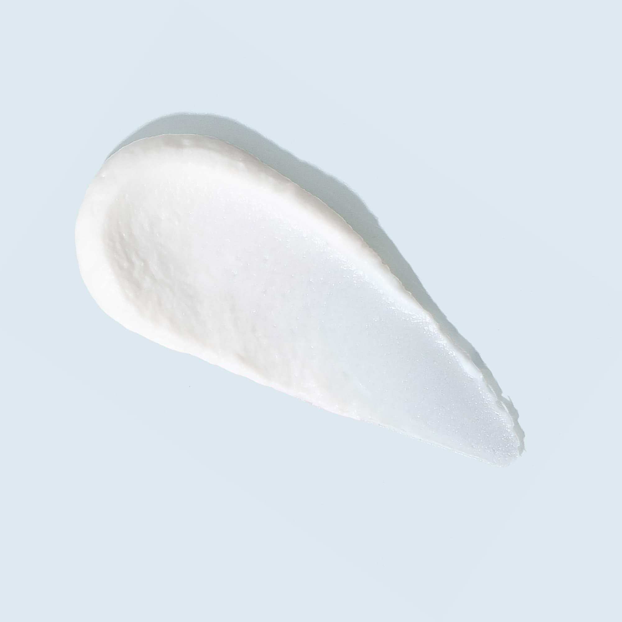 TiZO2 primer texture close-up highlights silky, weightless, makeup-ready skin.