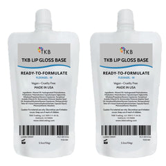 TKB Lip Gloss Base Flexagel M crystal clear bottle closeup showing clarity and potential for even color payoff