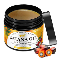 TKTALKER Batana Oil bottle close-up for pure hair nourishment.