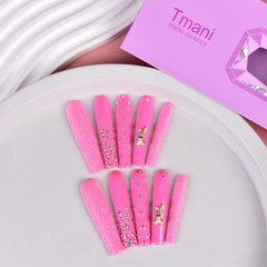 Tmani 10-piece set includes file and glue for easy at-home manicure.