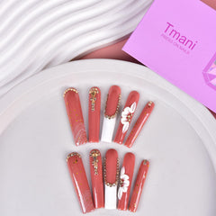 Tmani press-on nails in purple storage box for easy organization