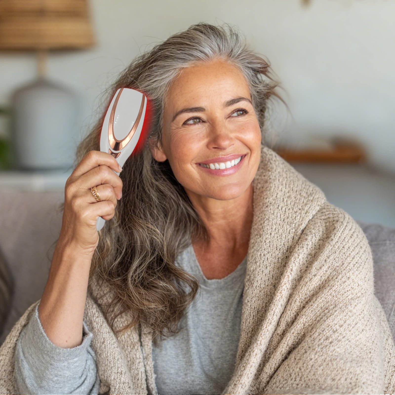 TMOSSO Laser Therapy Hair Growth Comb shows visible red light during use
