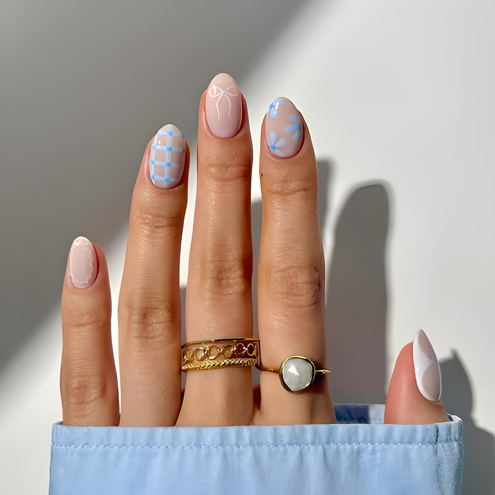 Tnbuokas almond press on nails with short white bow for quick, stylish manicures.