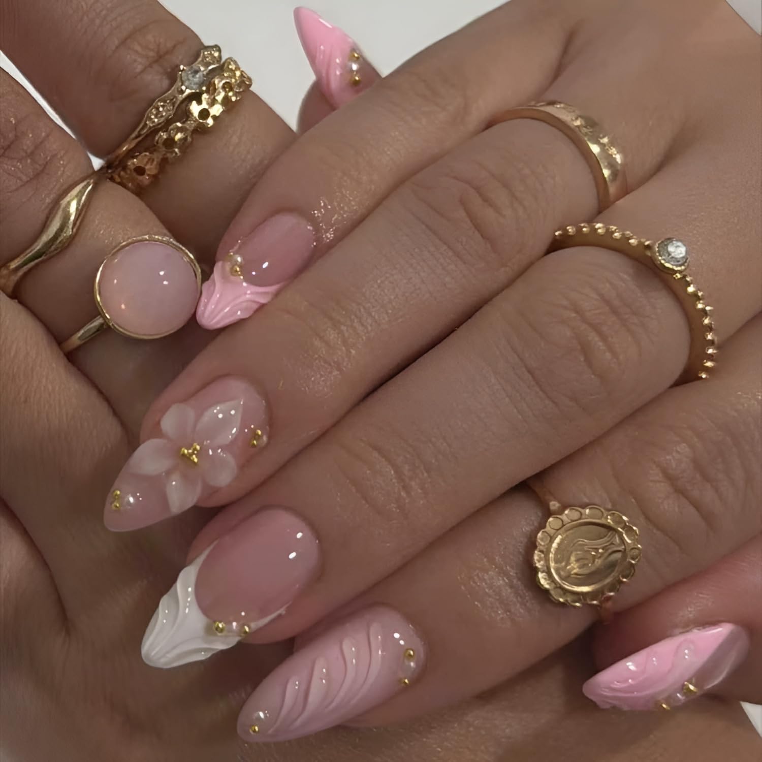 Tnbuokas glossy pink nails with gold rhinestones for party-ready style