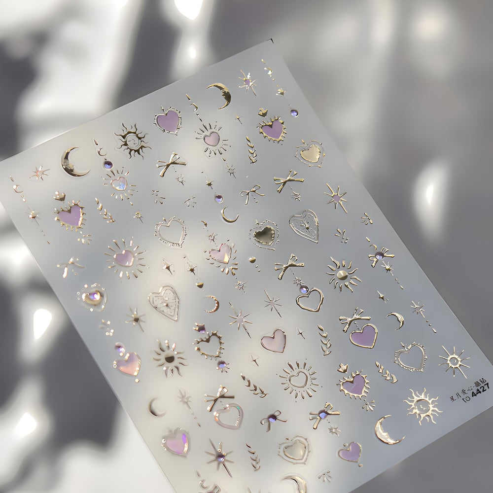Tnbuokas bow design gold decals add elegant accents to gel or acrylic nails.