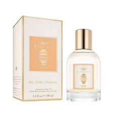 TOCCA Stella dry oil bottle showing quick-absorbing hydration for skin.