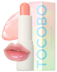TOCOBO Glow Ritual Lip Balm Coral Water swatch showing subtle coral color and moisture