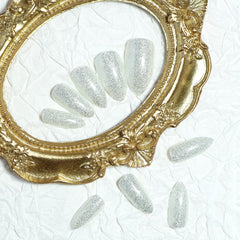 TOGZOM medium almond nail design close-up showing smooth finish.