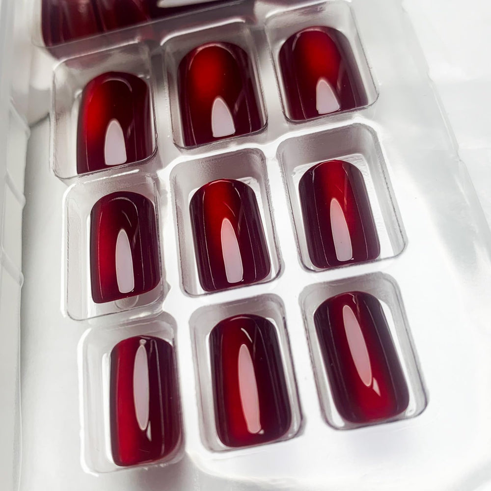 TOGZOM nails with file and remover stick for easy at-home manicure.