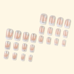 TOGZOM glitter square nails in silver for a party-ready sparkle effect.